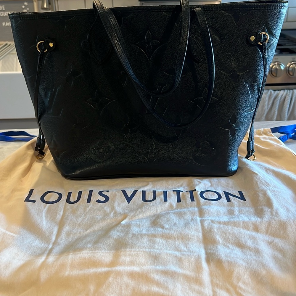 Louis Vuitton Neverfull MM in Empreinte Noir Leather